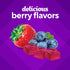 VF Hair, Skin & Nails Gummy with a strawberry, blueberries, and three red swirl-top gummies. Text: 'delicious berry flavors'.