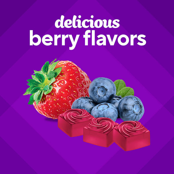 VF Hair, Skin & Nails Gummy with a strawberry, blueberries, and three red swirl-top gummies. Text: 'delicious berry flavors'.